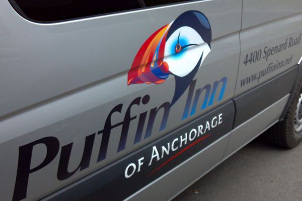 Pinted Logo & Graphics on Silver Puffin Inn Van
