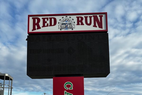 Red Run Pole Sign with Digital Display